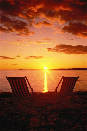 empty beach sunrise - Back View of Deck Chairs on Beach At Sunset, Ottawa River Ottawa, Ontario, Canada Stock Photo - Rights-Managed, Code: 700-00057616