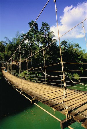 Wooden Suspension Bridge over Lake, near Bilar, Bohol Province Philippines Stock Photo - Rights-Managed, Code: 700-00057681