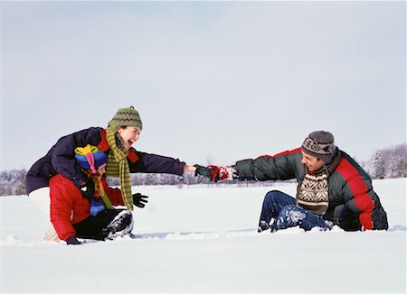 Family Playing Outdoors in Winter Stock Photo - Rights-Managed, Code: 700-00057890