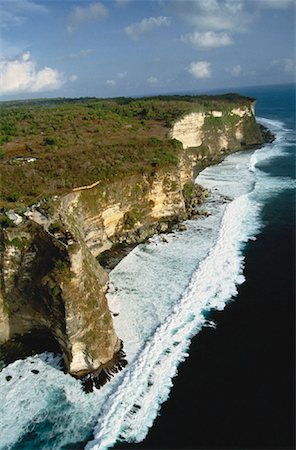 pura luhur uluwatu temple - Aerial View of Uluwatu Temple on Cliff Bali, Indonesia Foto de stock - Con derechos protegidos, Código: 700-00057961