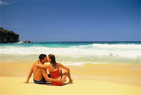 Back View of Couple in Swimwear Kissing on Beach Dominican Republic, Caribbean Foto de stock - Con derechos protegidos, Código: 700-00058276