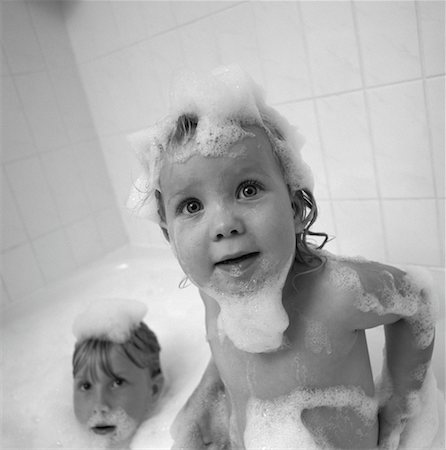 sisters bathing - Children Covered in Bubbles in Bathtub Stock Photo - Rights-Managed, Code: 700-00058343