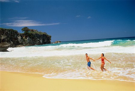 Couple in Swimwear, Walking in Surf on Beach Dominican Republic, Caribbean Foto de stock - Con derechos protegidos, Código: 700-00058398
