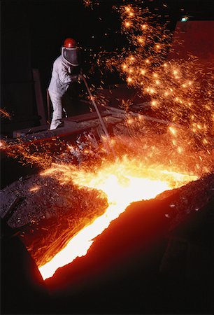 Worker Stoking Molten Steel at China Steel Corporation, Taiwan Stock Photo - Rights-Managed, Code: 700-00058600