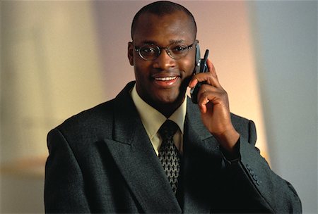 simsearch:700-00049474,k - Portrait of Businessman Using Cell Phone Stock Photo - Rights-Managed, Code: 700-00058942