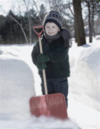 Portrait of Boy with Shovel Outdoors in Winter Stock Photo - Rights-Managed, Code: 700-00059027