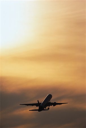 Airplane Taking Off at Sunset Stock Photo - Rights-Managed, Code: 700-00059140