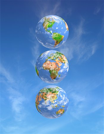 simsearch:700-00039734,k - Three Globes Displaying Continents of the World with Sky Foto de stock - Con derechos protegidos, Código: 700-00059270