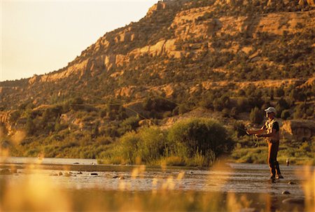 simsearch:622-02913456,k - Man Fly Fishing at Sunset San Juan River, New Mexico, USA Fotografie stock - Rights-Managed, Codice: 700-00059532