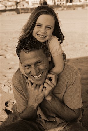 piggyback daughter at beach - Portrait of Father and Daughter On Beach Stock Photo - Rights-Managed, Code: 700-00059785