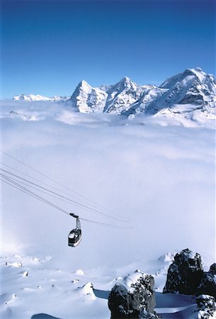 simsearch:700-00059913,k - Aperçu des montagnes et du téléphérique avec la région de Jungfrau brouillard, Suisse Photographie de stock - Rights-Managed, Code: 700-00059903