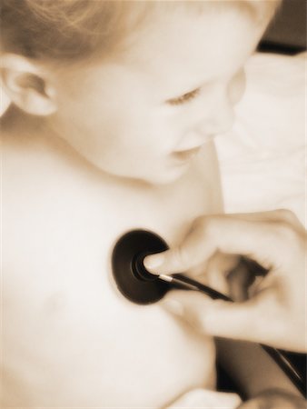 Close-Up of Doctor Using Stethoscope on Child Stock Photo - Rights-Managed, Code: 700-00050875