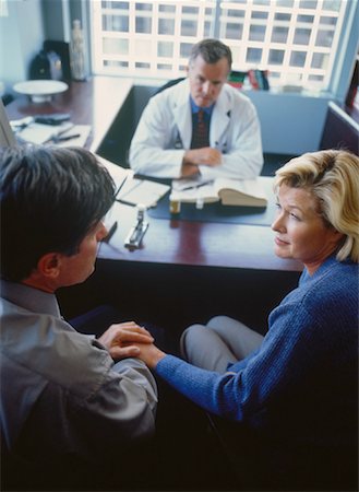 Mature Couple in Doctor's Office Foto de stock - Con derechos protegidos, Código: 700-00050990