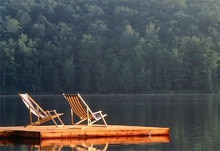 empty chair on dock - Deck Chairs on Dock at Sunrise Meech Lake, Quebec, Canada Stock Photo - Rights-Managed, Code: 700-00051274