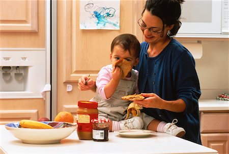 peanut butter woman - Mother and Child in Kitchen Making Sandwiches Stock Photo - Rights-Managed, Code: 700-00051390