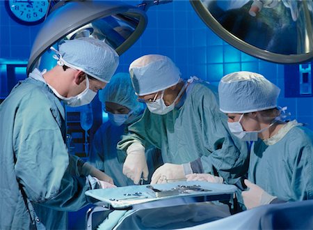 simsearch:673-02141022,k - Surgeons Performing Operation Stock Photo - Rights-Managed, Code: 700-00051447