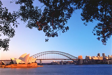 Sydney Opera House et le Harbour Bridge au lever du soleil New South Wales, Australie Photographie de stock - Rights-Managed, Code: 700-00051921