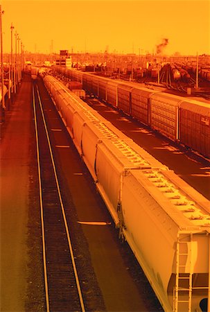Trains and Rail Yard at Sunset Calgary, Alberta, Canada Stock Photo - Rights-Managed, Code: 700-00052442
