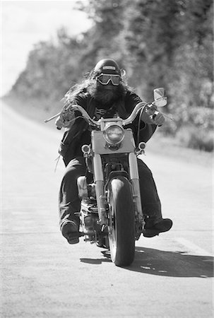 rebel motorbike beard - Biker Riding Motorcycle on Road Ontario, Canada Stock Photo - Rights-Managed, Code: 700-00053299