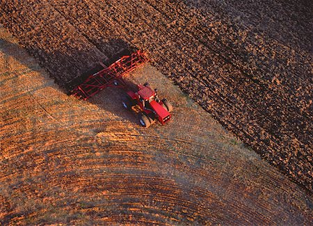 Aerial View of Tractor on Field Holland, Manitoba, Canada Stock Photo - Rights-Managed, Code: 700-00053394