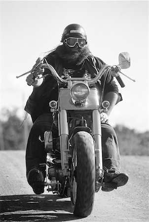 rebel motorbike beard - Biker Riding Motorcycle on Road Ontario, Canada Stock Photo - Rights-Managed, Code: 700-00053423