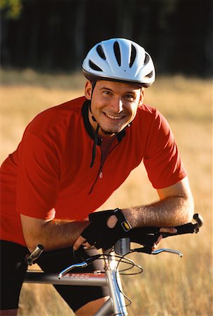simsearch:700-00053390,k - Portrait of Man on Mountain Bike In Field of Tall Grass Foto de stock - Con derechos protegidos, Código: 700-00053469