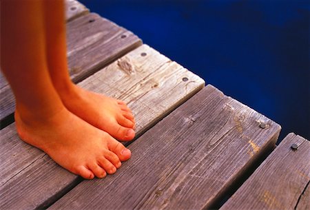 simsearch:700-00053794,k - Close-Up of Child's Feet on Dock Stock Photo - Rights-Managed, Code: 700-00053794