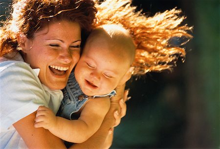 simsearch:700-00074987,k - Mother Holding Baby, Laughing Outdoors Stock Photo - Rights-Managed, Code: 700-00053847