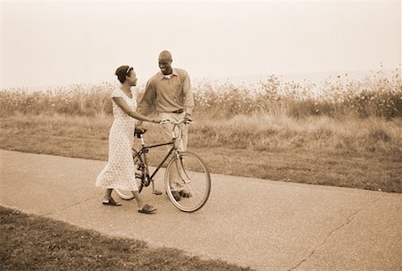 Couple Walking on Path with Bicycle Stock Photo - Rights-Managed, Code: 700-00053992