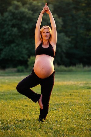 simsearch:700-00095929,k - Pregnant Woman Doing Yoga Outdoors Stock Photo - Rights-Managed, Code: 700-00064229