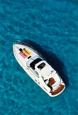 someone laying down aerial view - Overhead View of Women Tanning On Deck of Boat, Bahamas Stock Photo - Rights-Managed, Code: 700-00064328