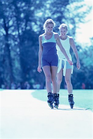 Mother and Daughter In-Line Skating on Path Stock Photo - Rights-Managed, Code: 700-00064940