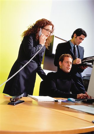 simsearch:700-00045026,k - Business People Working in Office Foto de stock - Con derechos protegidos, Código: 700-00064951