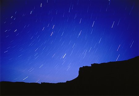 simsearch:862-06677509,k - Star Trails and Silhouette of Rock Formation Utah, USA Stock Photo - Rights-Managed, Code: 700-00065017