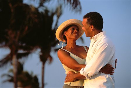 Mature Couple Embracing On Beach Stock Photo - Rights-Managed, Code: 700-00065021