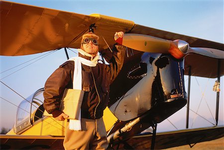 Portrait of Pilot with Tiger Moth Airplane Stock Photo - Rights-Managed, Code: 700-00065023