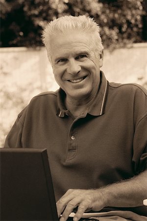 peter griffith - Portrait of Mature Man with Laptop Computer Outdoors Stock Photo - Rights-Managed, Code: 700-00065090