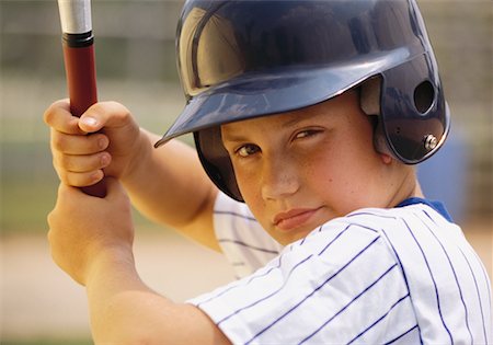 Close-Up of Boy Wearing Baseball Helmet, Holding Bat Stock Photo - Rights-Managed, Code: 700-00065282