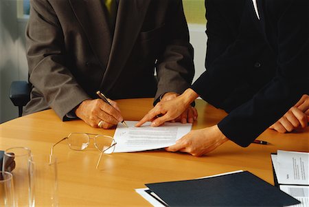 pen two hands - View of Table and Hands in Meeting in Boardroom Stock Photo - Rights-Managed, Code: 700-00065844