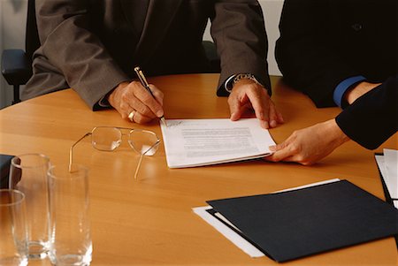 pen two hands - View of Table and Hands in Meeting in Boardroom Stock Photo - Rights-Managed, Code: 700-00065845