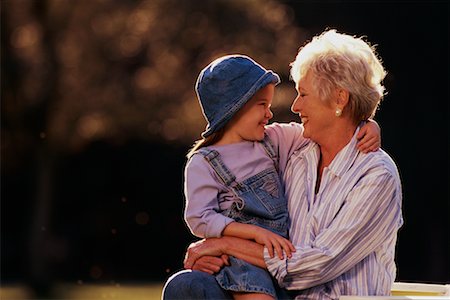 simsearch:700-00046921,k - Grandmother and Granddaughter Sitting Outdoors, Smiling Stock Photo - Rights-Managed, Code: 700-00066168