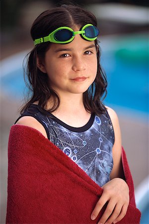 simsearch:700-00085614,k - Portrait de jeune fille en maillot de bain et des lunettes au bord piscine Photographie de stock - Rights-Managed, Code: 700-00066273