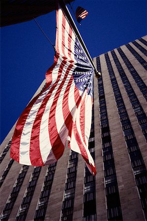 simsearch:600-03075824,k - American Flag and Rockefeller Center, New York, New York, USA Fotografie stock - Rights-Managed, Codice: 700-00066337