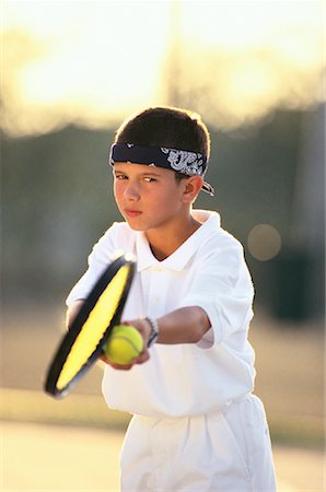 Boy Playing Tennis Stock Photo - Rights-Managed, Code: 700-00066371