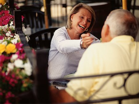 Mature Couple Eating at Outdoor Cafe Stock Photo - Rights-Managed, Code: 700-00066499