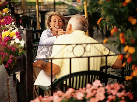 Mature Couple Eating at Outdoor Cafe Stock Photo - Rights-Managed, Code: 700-00066500