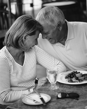 Mature Couple Face to Face at Outdoor Cafe Stock Photo - Rights-Managed, Code: 700-00066755