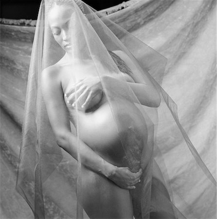 pregnancy nude - Portrait of Nude Pregnant Woman Under Sheer Fabric Foto de stock - Con derechos protegidos, Código: 700-00067617