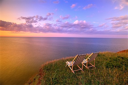 Chaises longues près de la rive au lever du soleil du golfe du Saint-Laurent, Cap Tryon Prince Edward Island, Canada Photographie de stock - Rights-Managed, Code: 700-00067645