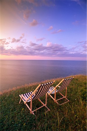 Chaises longues près de la rive au lever du soleil du golfe du Saint-Laurent, Cap Tryon Prince Edward Island, Canada Photographie de stock - Rights-Managed, Code: 700-00067646